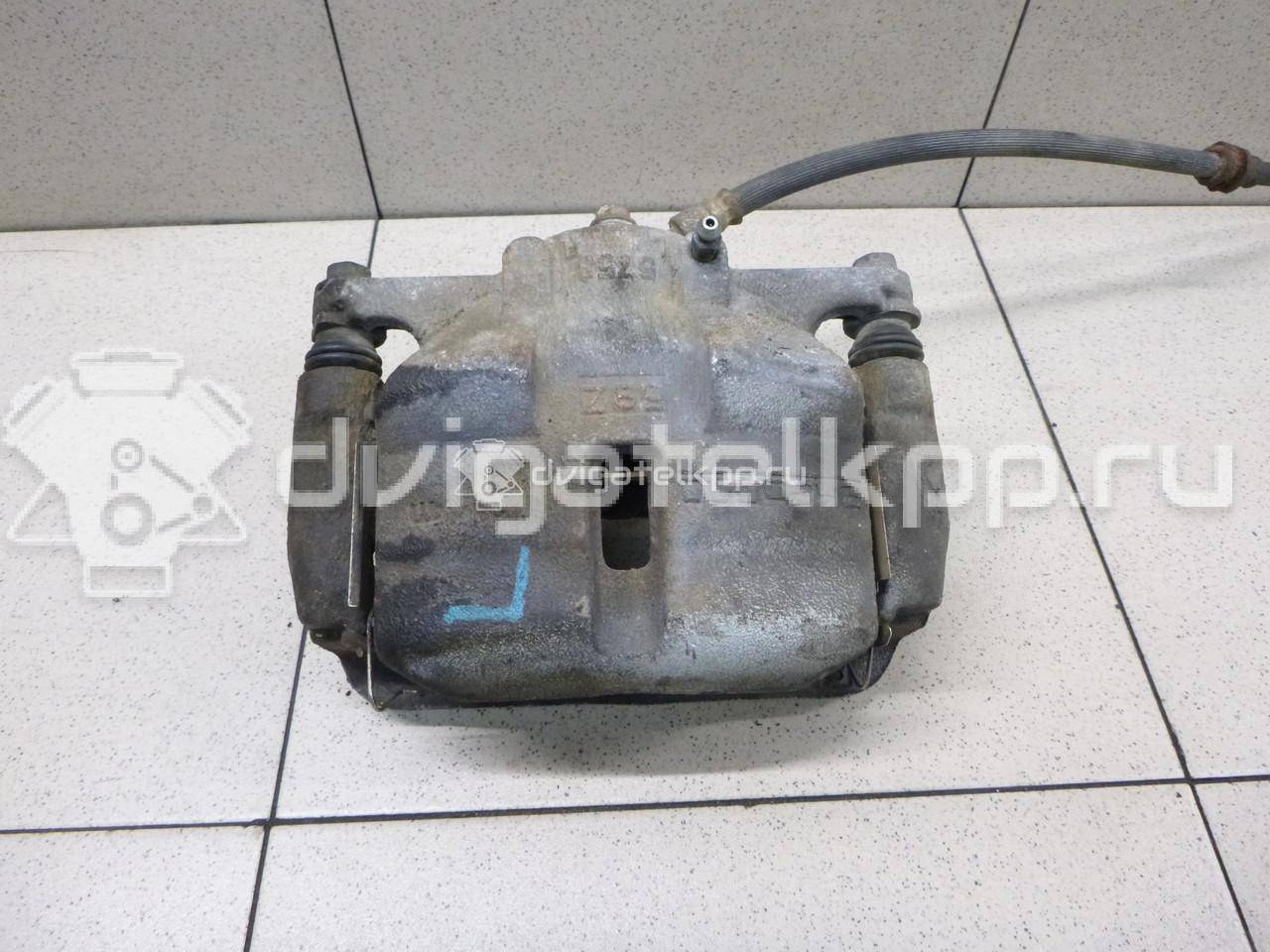 Фото Суппорт тормозной передний левый  410114EA0A для Nissan Qashqai {forloop.counter}}