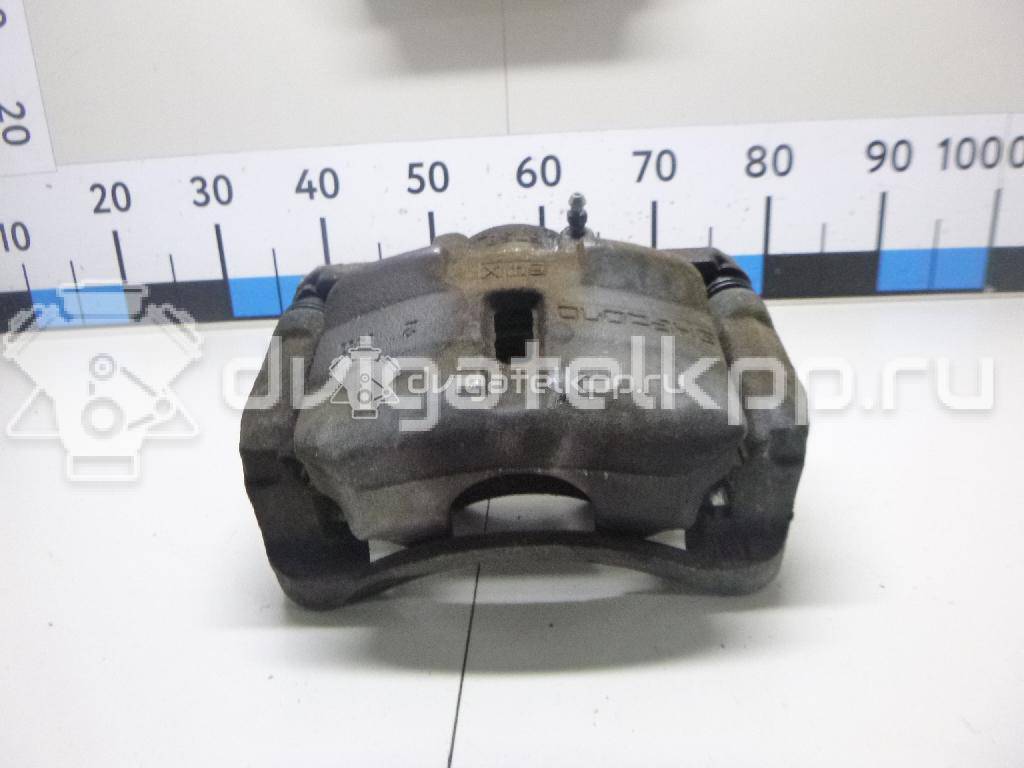 Фото Суппорт тормозной передний левый  410114EA0A для Nissan Qashqai {forloop.counter}}
