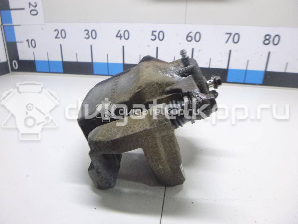 Фото Суппорт тормозной передний левый  410114EA0A для Nissan Qashqai {forloop.counter}}