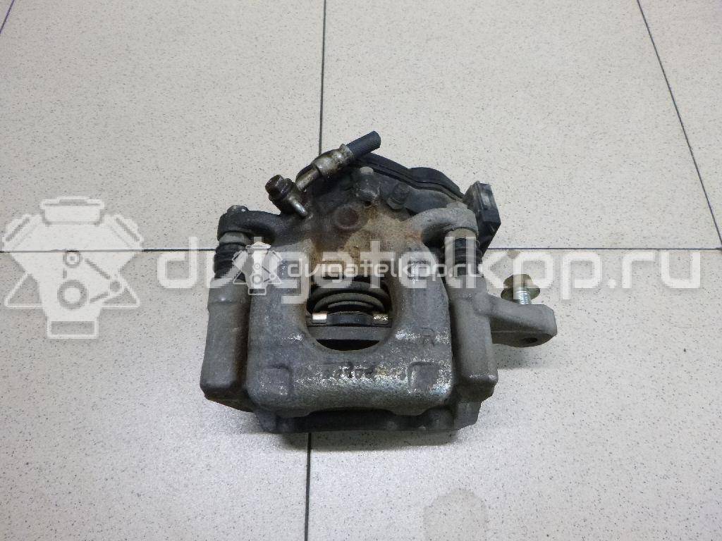 Фото Суппорт тормозной задний правый  440014EA0A для Nissan Qashqai {forloop.counter}}