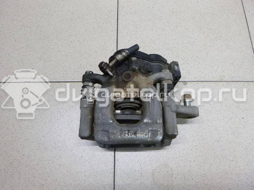 Фото Суппорт тормозной задний правый  440014EA0A для Nissan Qashqai {forloop.counter}}