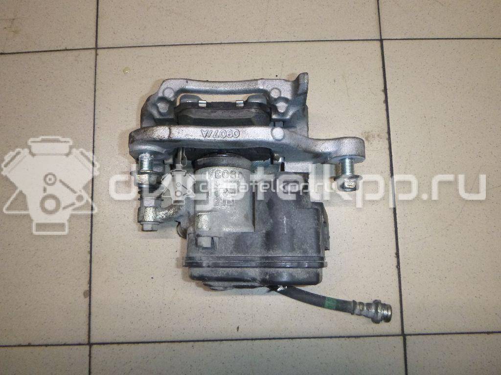 Фото Суппорт тормозной задний правый  440014EA0A для Nissan Qashqai {forloop.counter}}