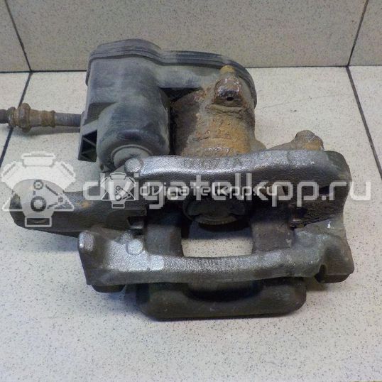 Фото Суппорт тормозной задний правый  440014EA0A для Nissan Qashqai