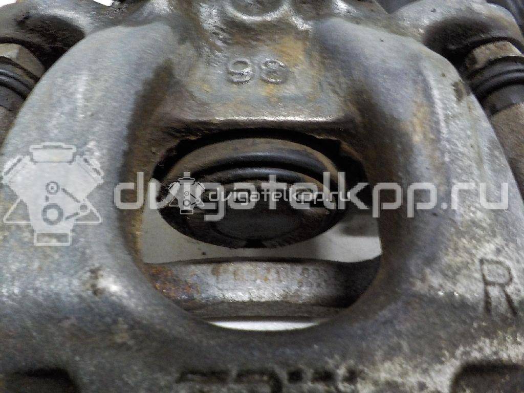 Фото Суппорт тормозной задний правый  440014EA0A для Nissan Qashqai {forloop.counter}}