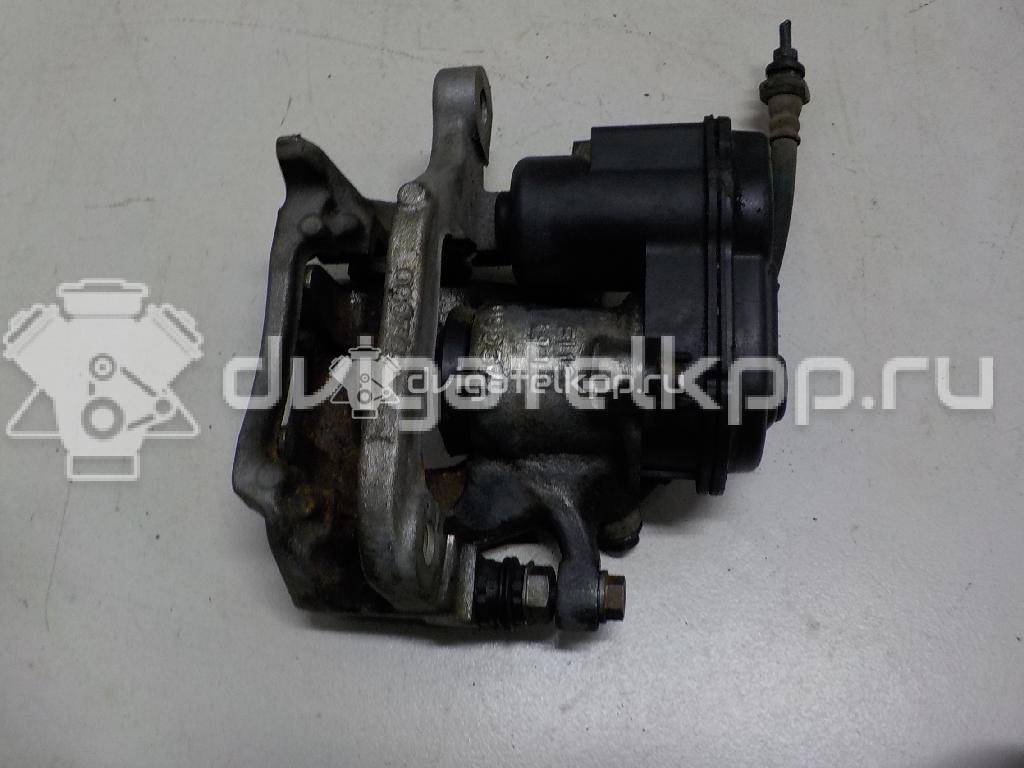 Фото Суппорт тормозной задний правый  440014EA0A для Nissan Qashqai {forloop.counter}}