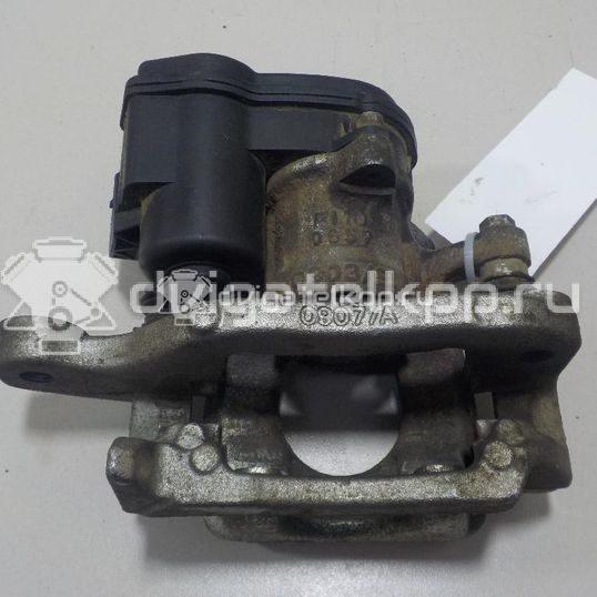 Фото Суппорт тормозной задний правый  440014EA0A для Nissan Qashqai