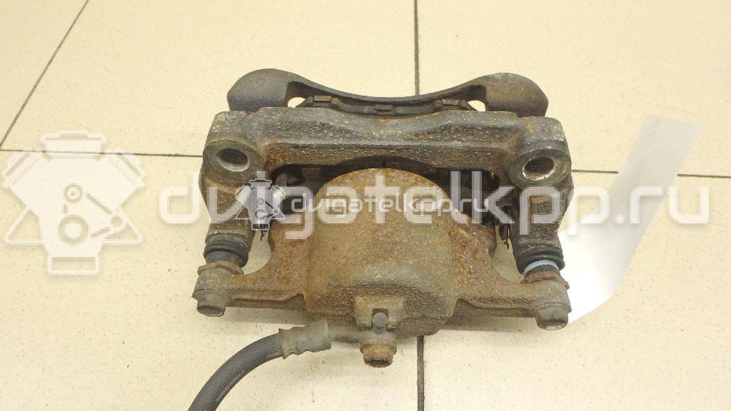 Фото Суппорт тормозной передний правый  410014EA0A для Nissan Qashqai {forloop.counter}}