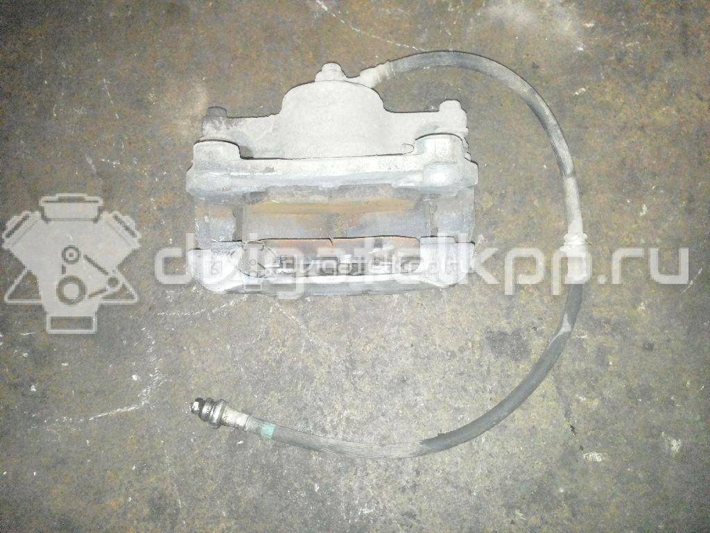 Фото Суппорт тормозной передний правый  410014EA0A для Nissan Qashqai {forloop.counter}}