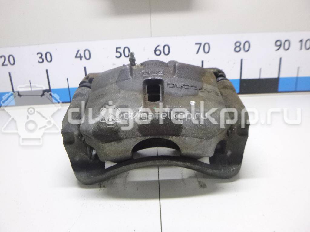 Фото Суппорт тормозной передний правый  410014EA0A для Nissan Qashqai {forloop.counter}}