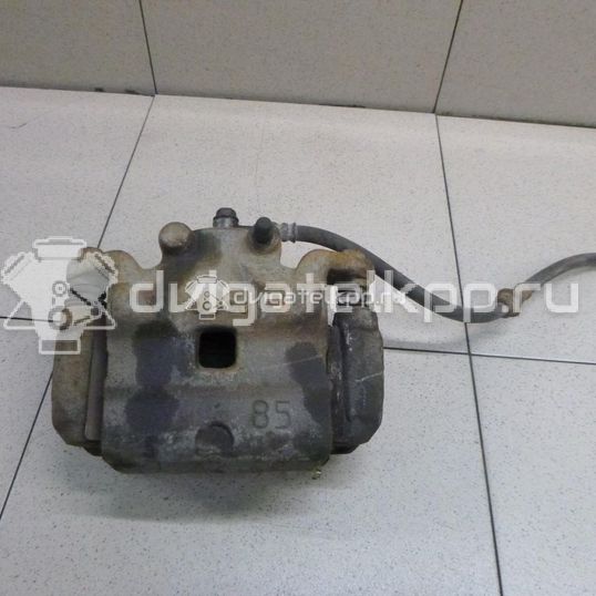 Фото Суппорт тормозной передний левый  41011JN00A для Nissan Juke F15 / Pulsar C13