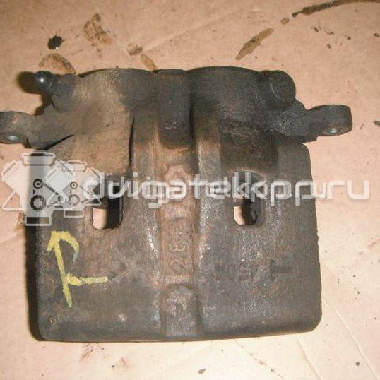 Фото Суппорт тормозной передний правый  410018H30A для Nissan X-Trail