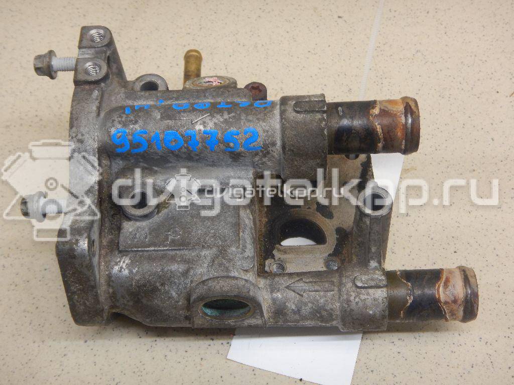 Фото Корпус термостата для двигателя Z 16 XE для Opel / Chevrolet / Vauxhall 101 л.с 16V 1.6 л бензин 55559594 {forloop.counter}}