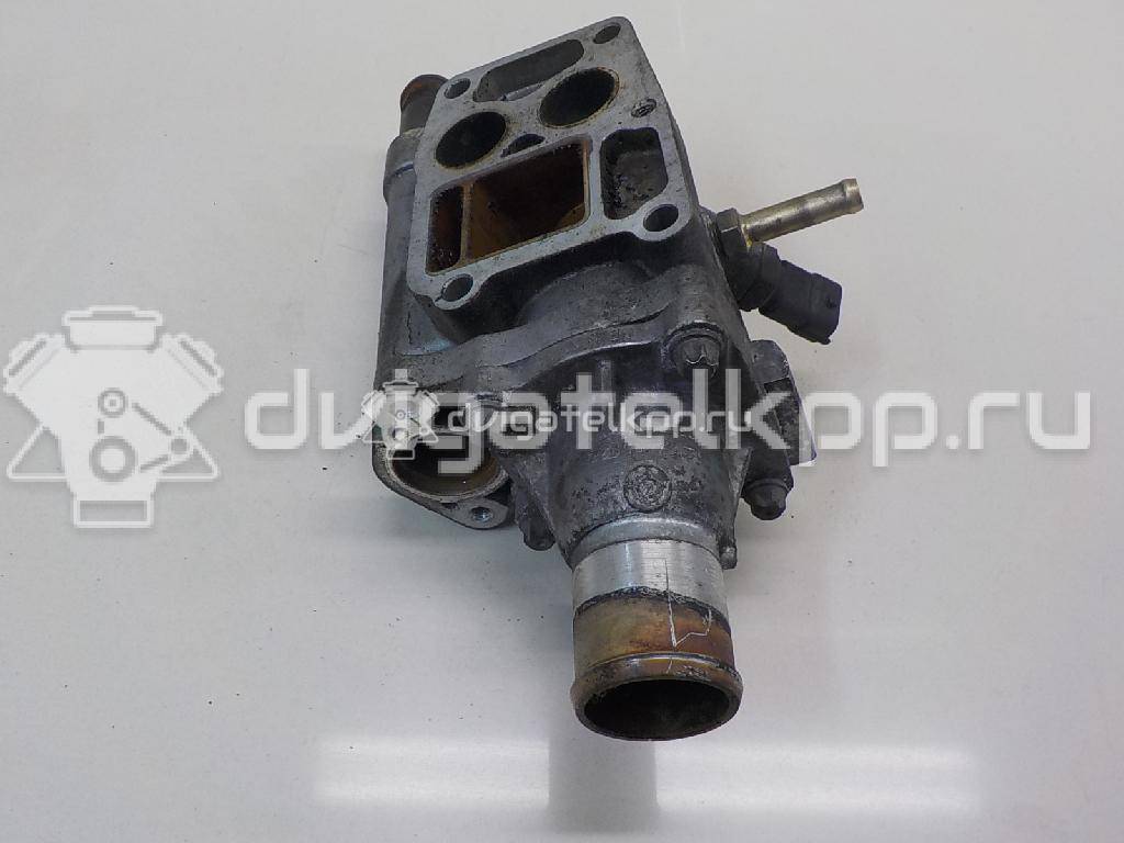 Фото Корпус термостата для двигателя Z 16 XE для Opel / Chevrolet / Vauxhall 85-101 л.с 16V 1.6 л бензин 55559594 {forloop.counter}}