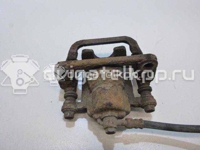 Фото Суппорт тормозной задний правый  44001JG00A для Nissan X-Trail {forloop.counter}}