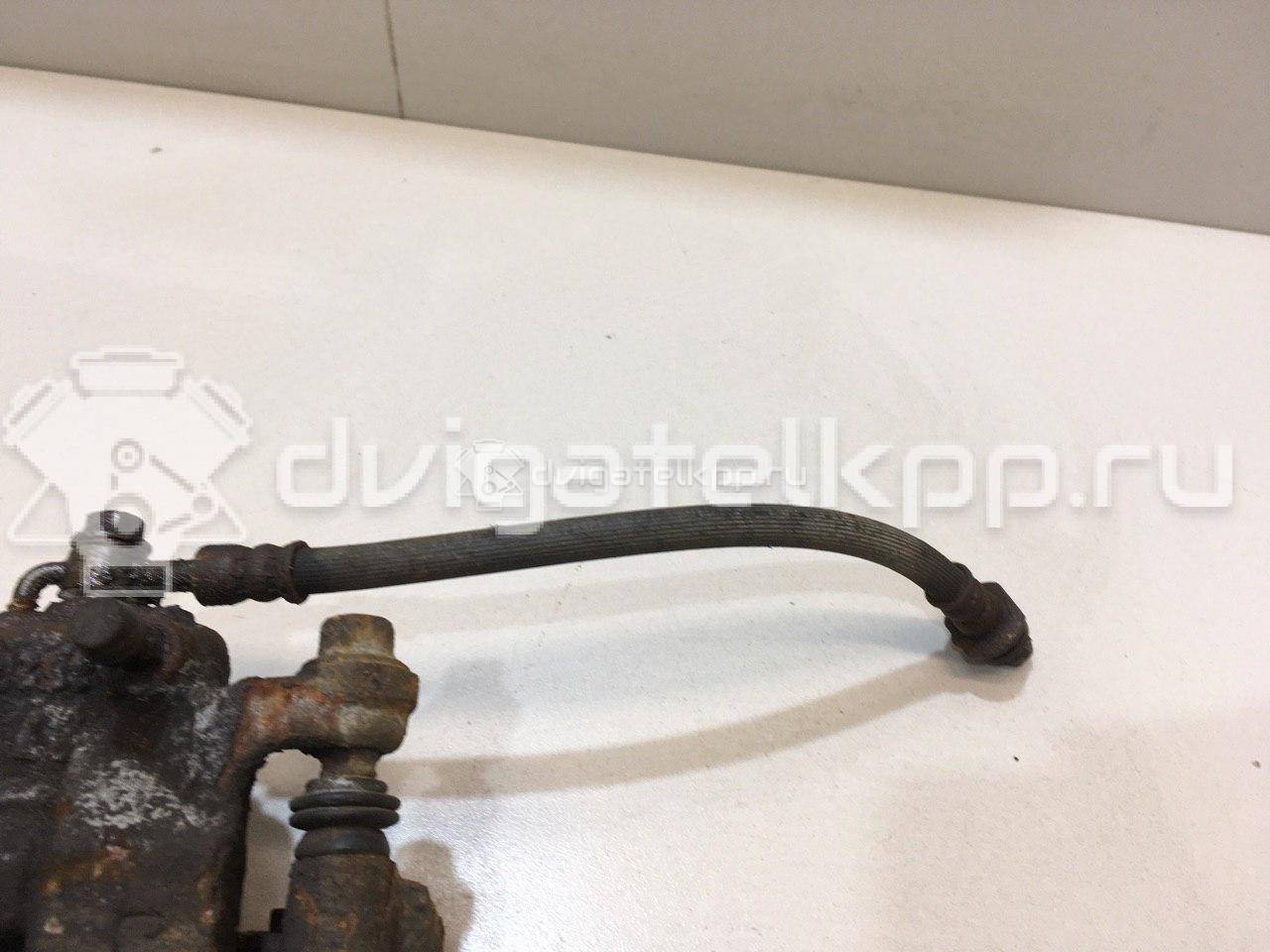 Фото Суппорт тормозной задний левый  44011JG00A для Nissan X-Trail {forloop.counter}}