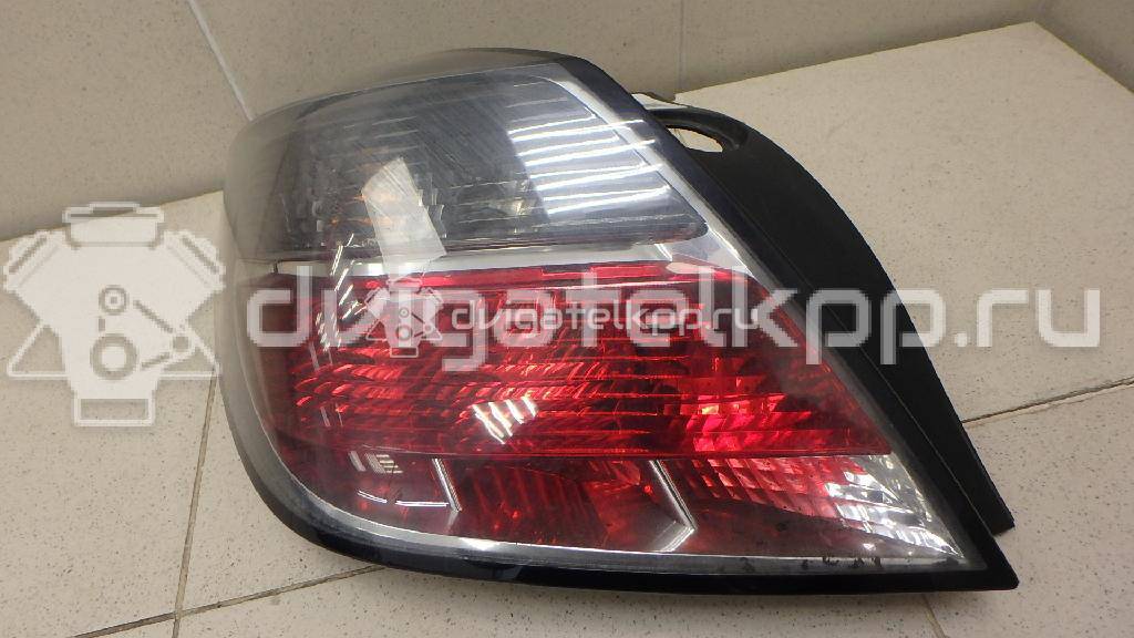 Фото Фонарь задний левый  1222117 для Opel Astra {forloop.counter}}