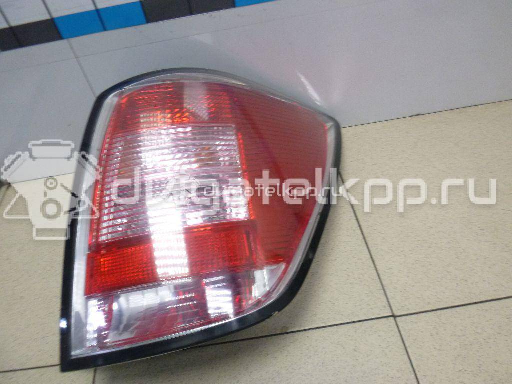 Фото Фонарь задний правый  93186477 для Opel Astra {forloop.counter}}