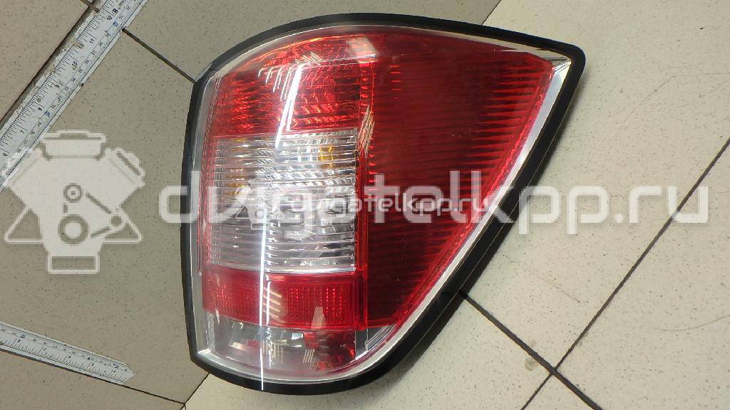 Фото Фонарь задний правый  93186477 для Opel Astra {forloop.counter}}