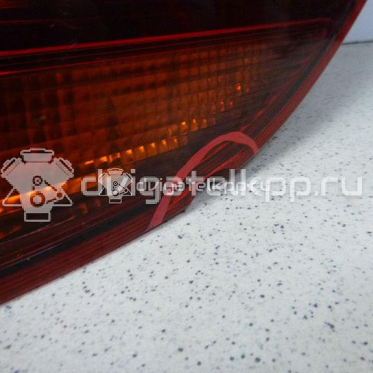Фото Фонарь задний наружный правый  13314051 для Opel Astra