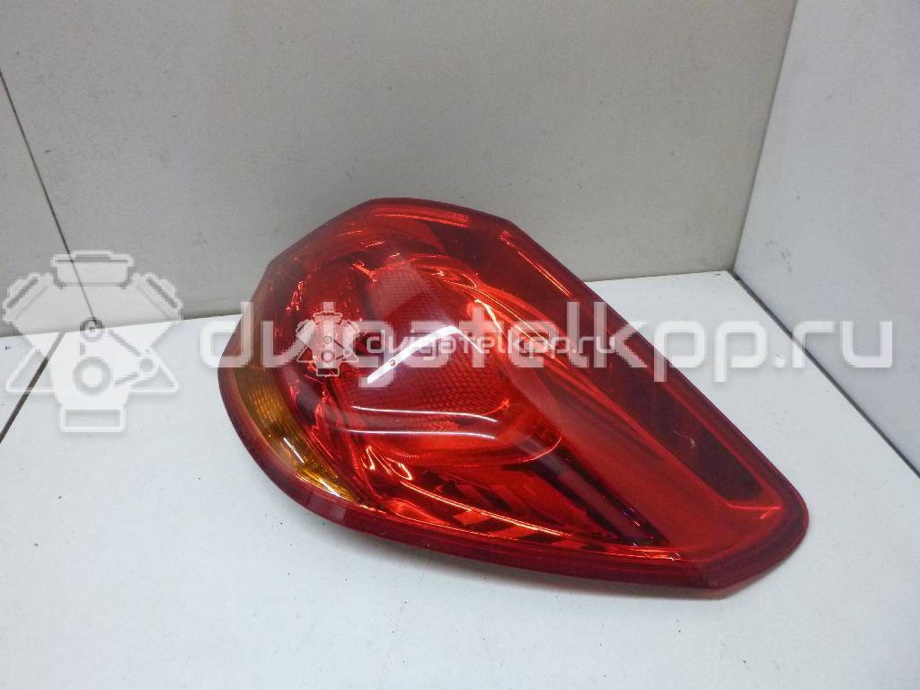 Фото Фонарь задний наружный правый  13306454 для Opel Astra {forloop.counter}}