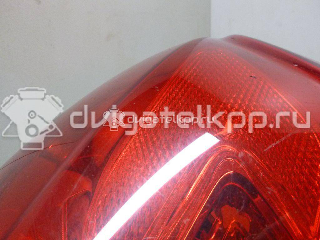 Фото Фонарь задний наружный правый  13306454 для Opel Astra {forloop.counter}}