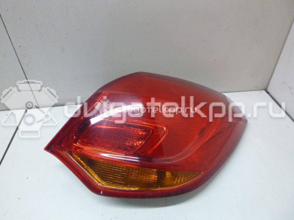 Фото Фонарь задний наружный правый  13306454 для Opel Astra {forloop.counter}}