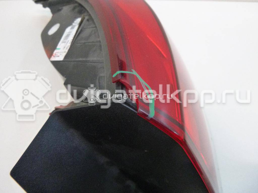 Фото Фонарь задний наружный правый  25870154 для Opel Astra {forloop.counter}}