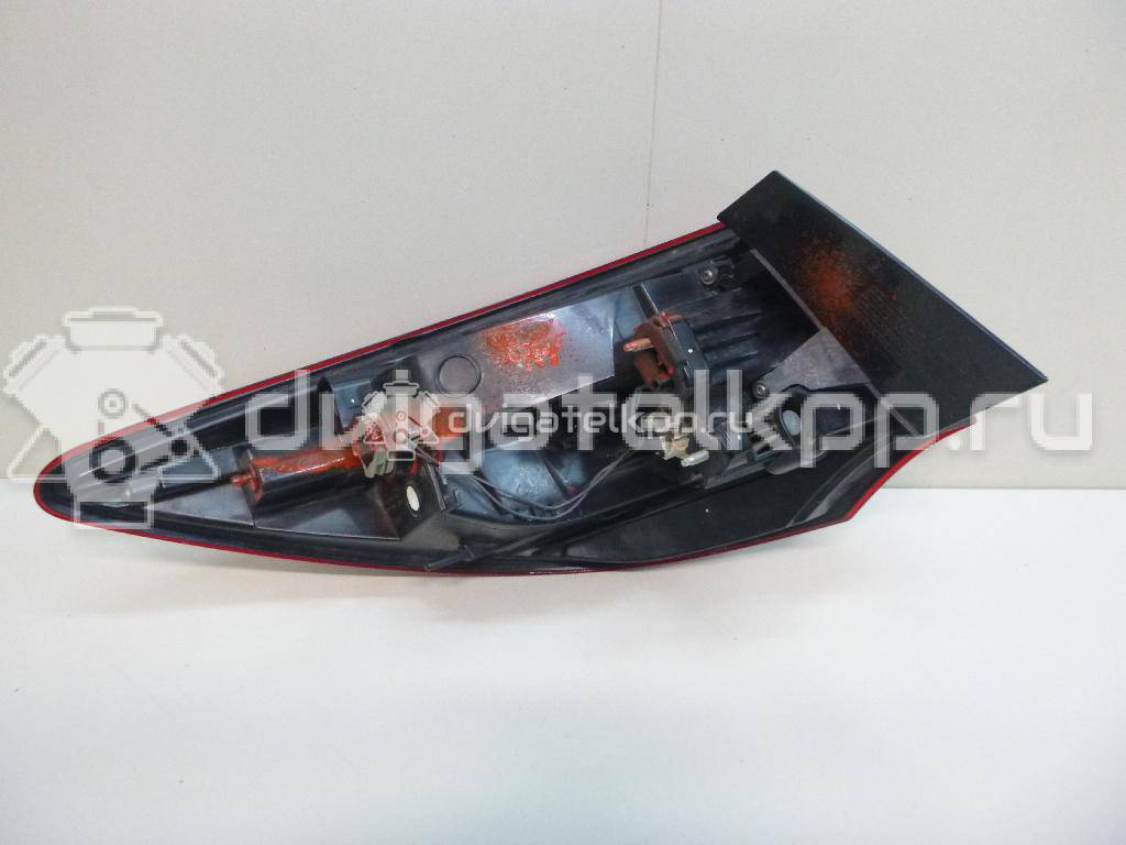 Фото Фонарь задний наружный правый  25870154 для Opel Astra {forloop.counter}}
