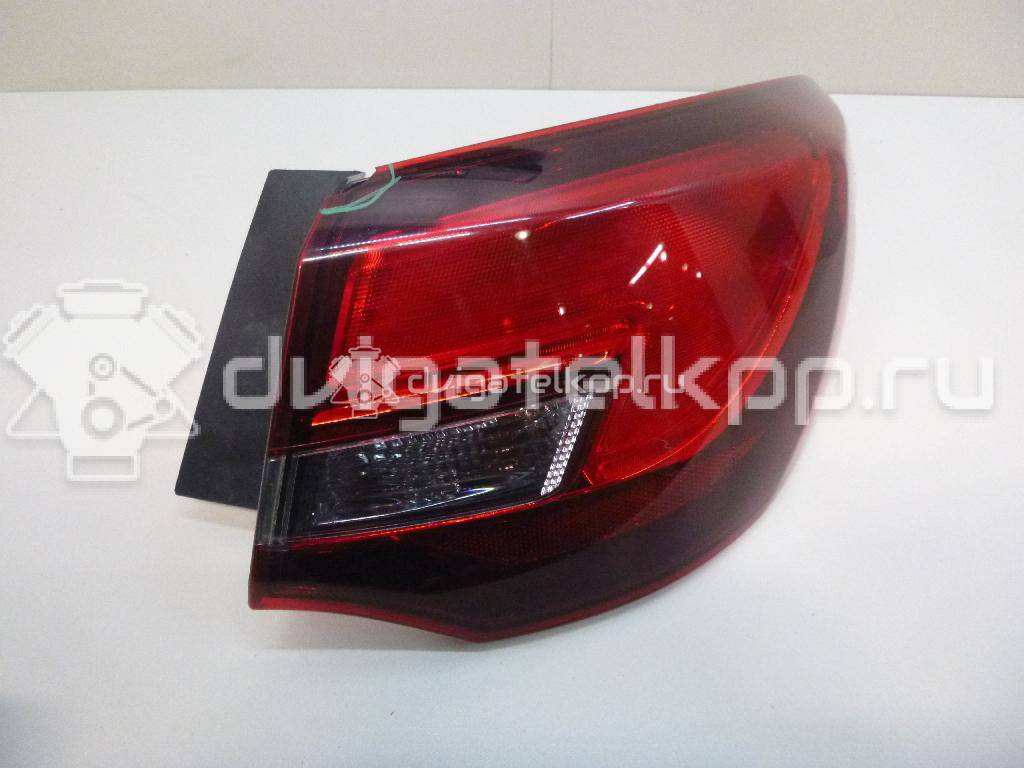 Фото Фонарь задний наружный правый  25870154 для Opel Astra {forloop.counter}}