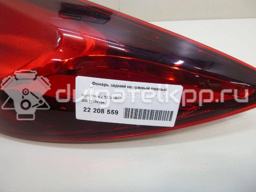 Фото Фонарь задний наружный правый  25870154 для Opel Astra {forloop.counter}}