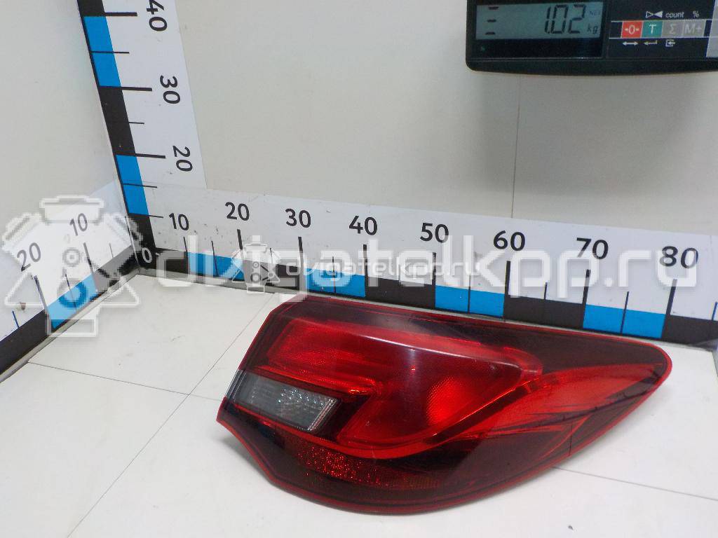 Фото Фонарь задний наружный правый  25870154 для Opel Astra {forloop.counter}}