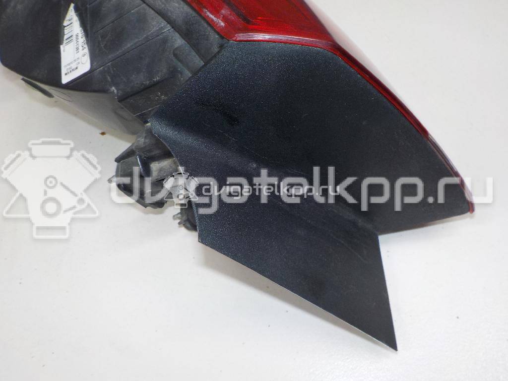 Фото Фонарь задний наружный правый  25870154 для Opel Astra {forloop.counter}}
