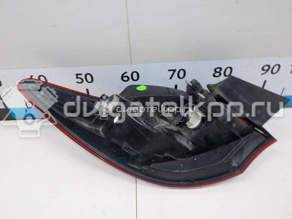 Фото Фонарь задний наружный правый  25870154 для Opel Astra {forloop.counter}}
