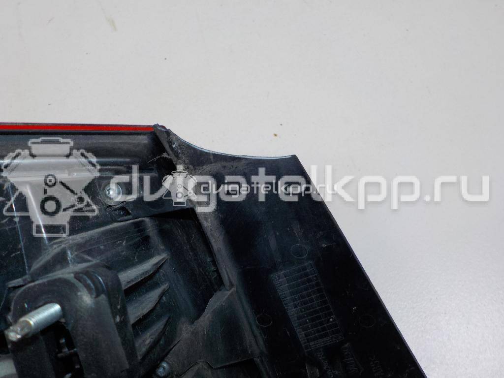 Фото Фонарь задний наружный правый  25870154 для Opel Astra {forloop.counter}}