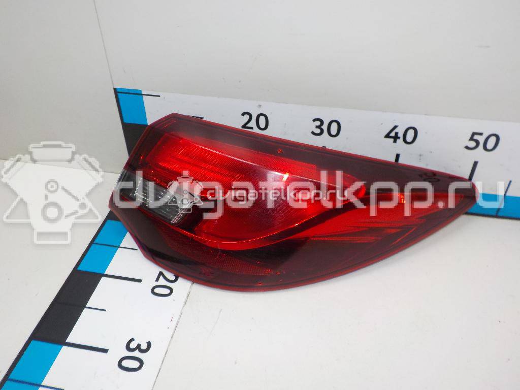 Фото Фонарь задний наружный правый  25870154 для Opel Astra {forloop.counter}}