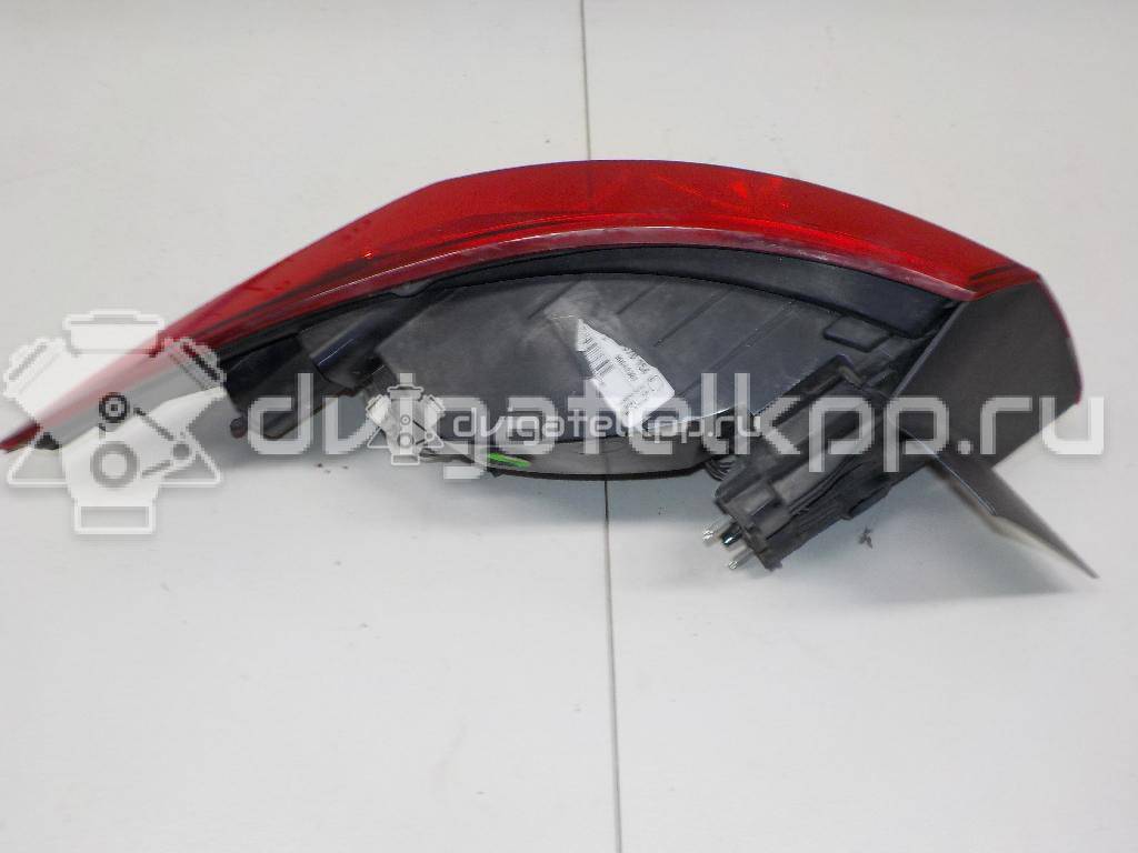 Фото Фонарь задний наружный правый  25870154 для Opel Astra {forloop.counter}}