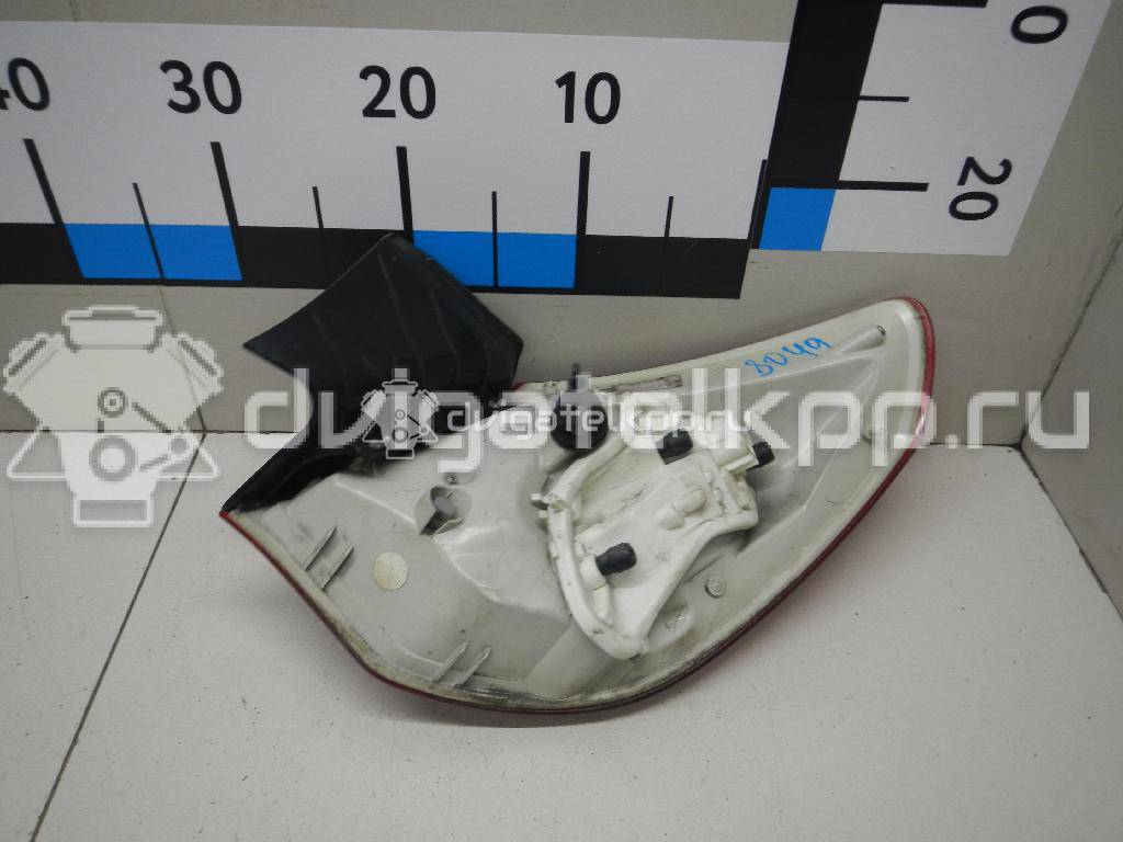 Фото Фонарь задний наружный левый  13306453 для Opel Astra {forloop.counter}}