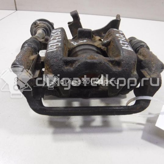 Фото Суппорт тормозной задний левый  13300883 для Opel Cascada W13 / Astra / Mokka X / Ampera / Insignia