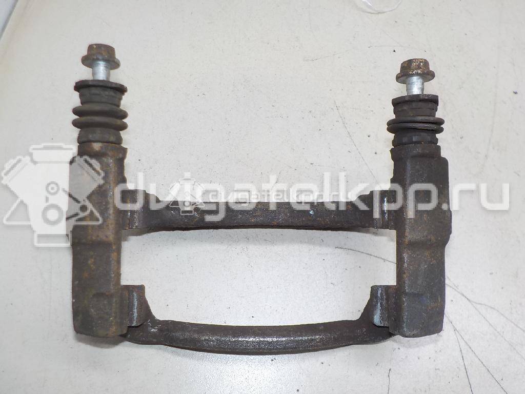Фото Скоба суппорта переднего  93185382 для Opel Tigra / Corsa / Combo / Meriva {forloop.counter}}
