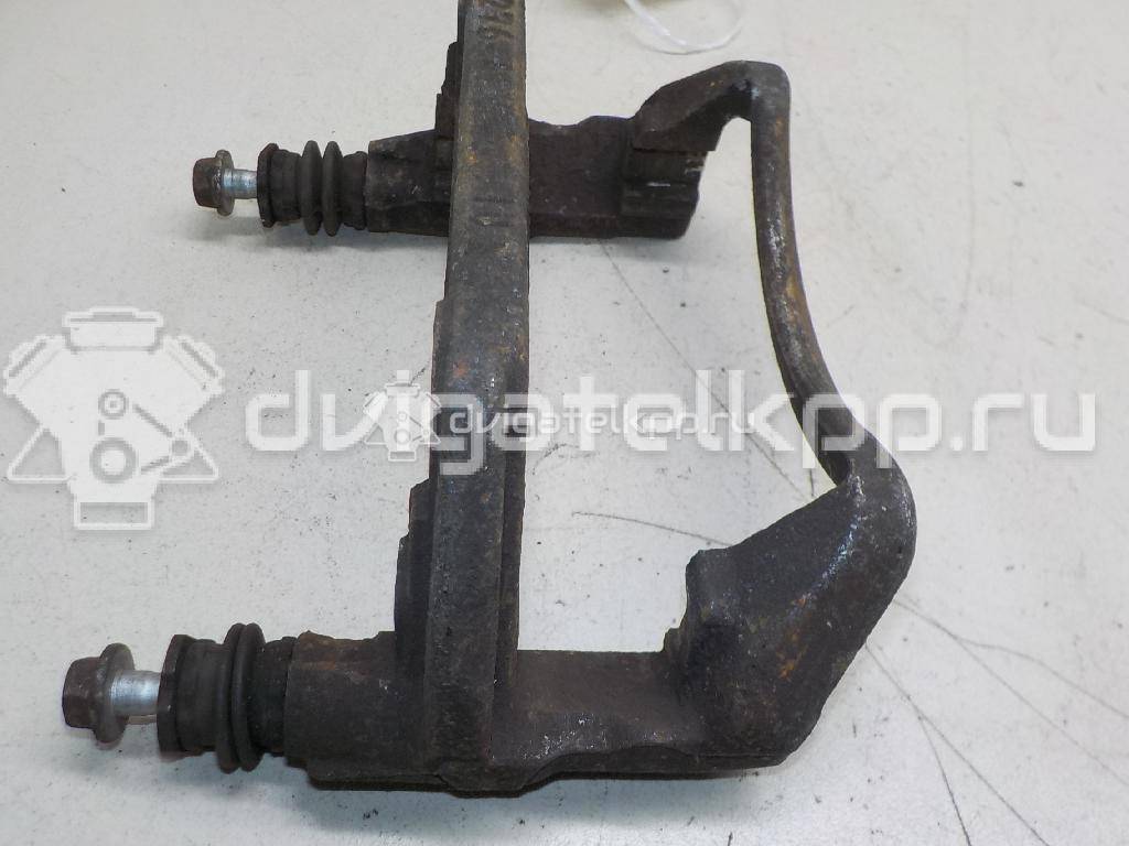 Фото Скоба суппорта переднего  93185382 для Opel Tigra / Corsa / Combo / Meriva {forloop.counter}}