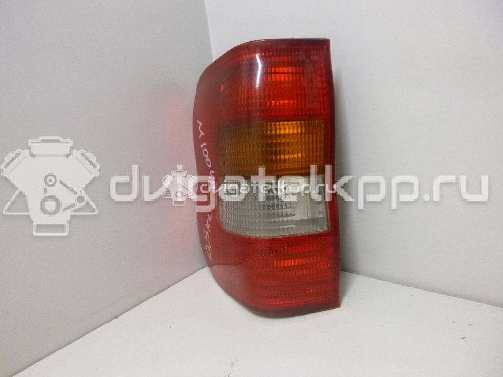 Фото Фонарь задний левый  90486263 для Opel Corsa / Combo {forloop.counter}}