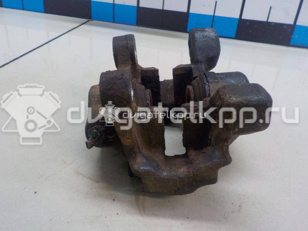 Фото Суппорт тормозной задний левый  9118536 для Opel Calibra A 85 / Astra / Kadett / Vectra / Omega , {forloop.counter}}