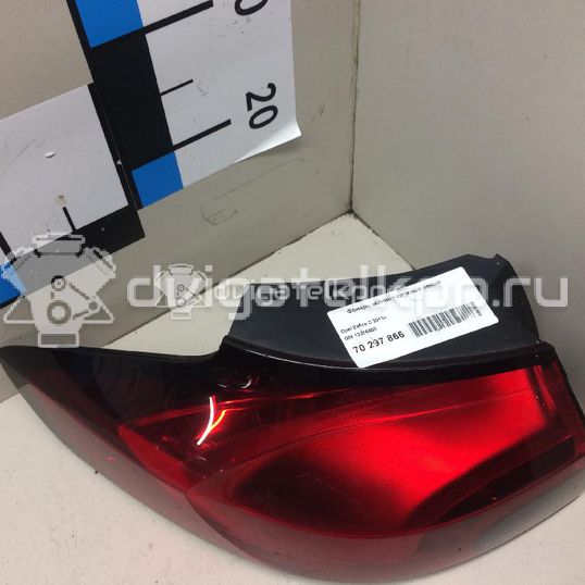 Фото Фонарь задний наружный левый  13386603 для Opel Zafira