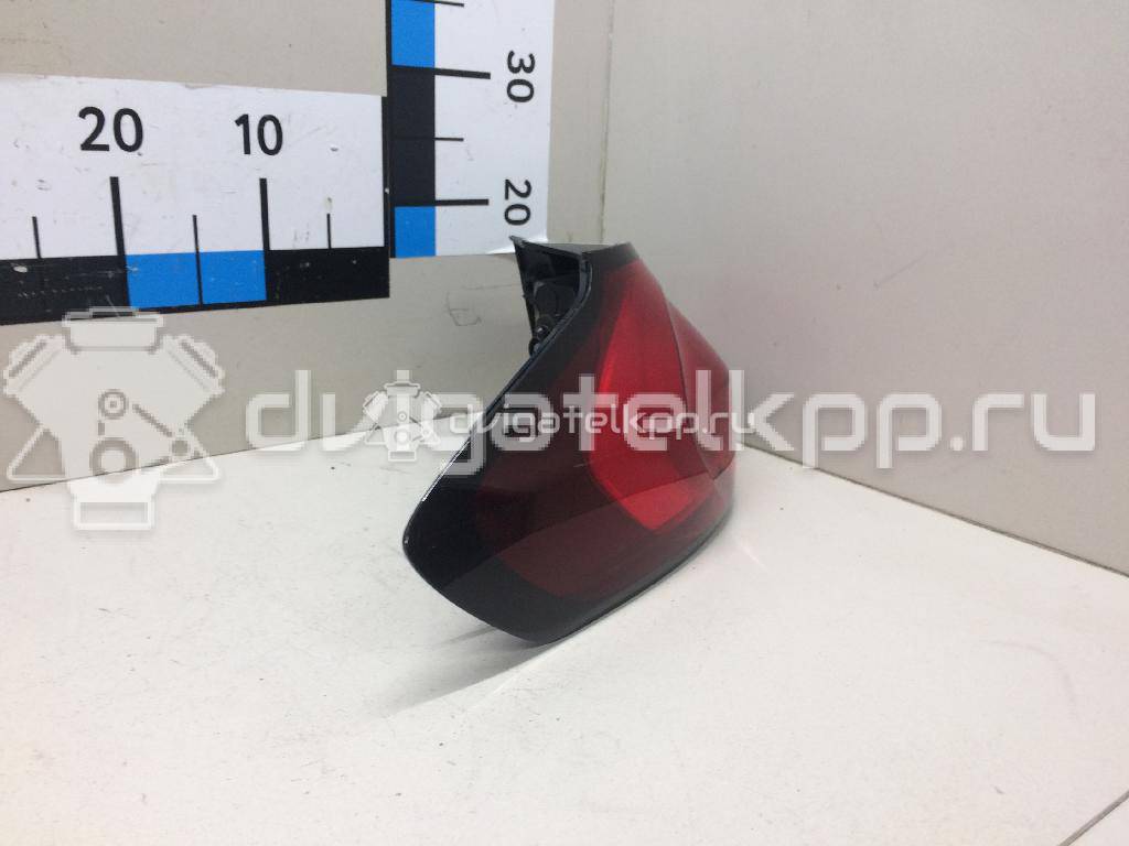Фото Фонарь задний наружный левый  13386603 для Opel Zafira {forloop.counter}}