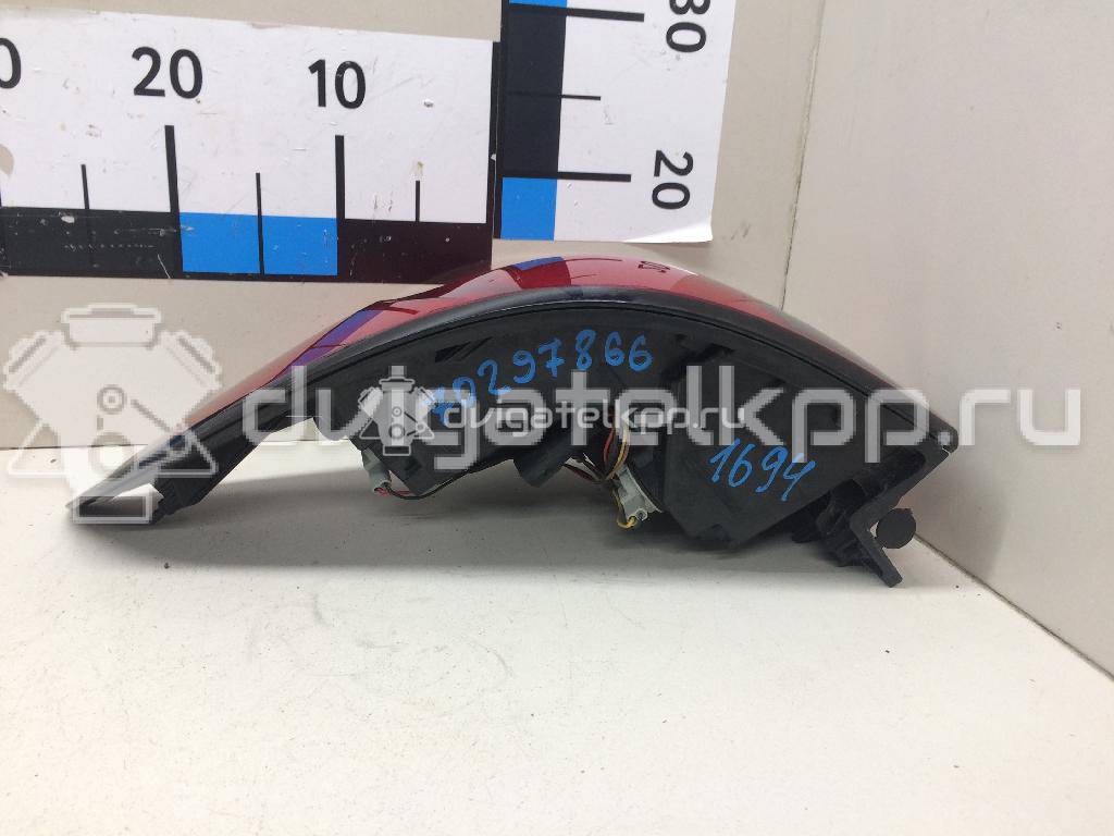 Фото Фонарь задний наружный левый  13386603 для Opel Zafira {forloop.counter}}