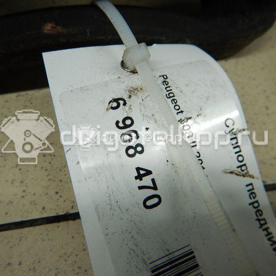 Фото Суппорт тормозной передний левый  1610698980 для Peugeot 308