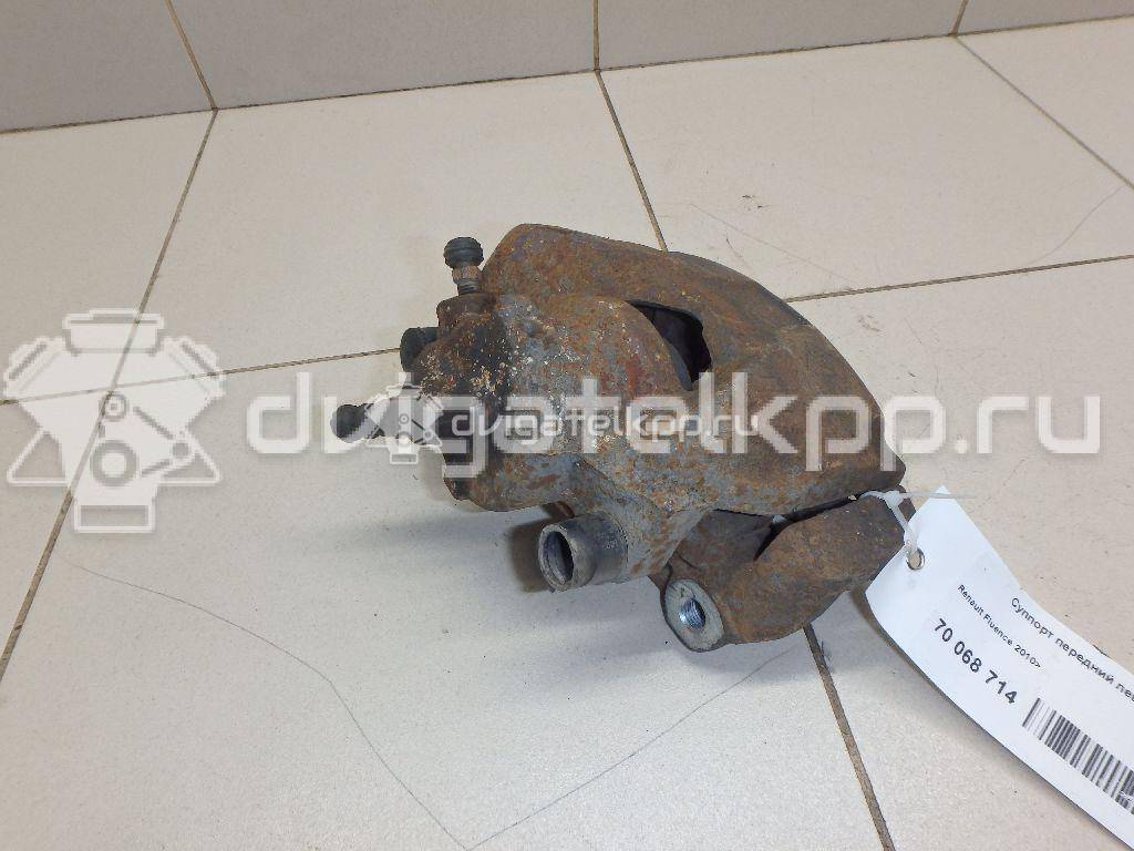 Фото Суппорт тормозной передний левый  410111495R для Renault Megane / Scénic / Grand / Captur J5 / Fluence L30 {forloop.counter}}