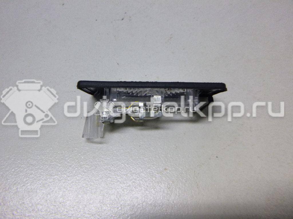 Фото Фонарь подсветки номера  5N0943021A для Seat Ibiza / Alhambra {forloop.counter}}