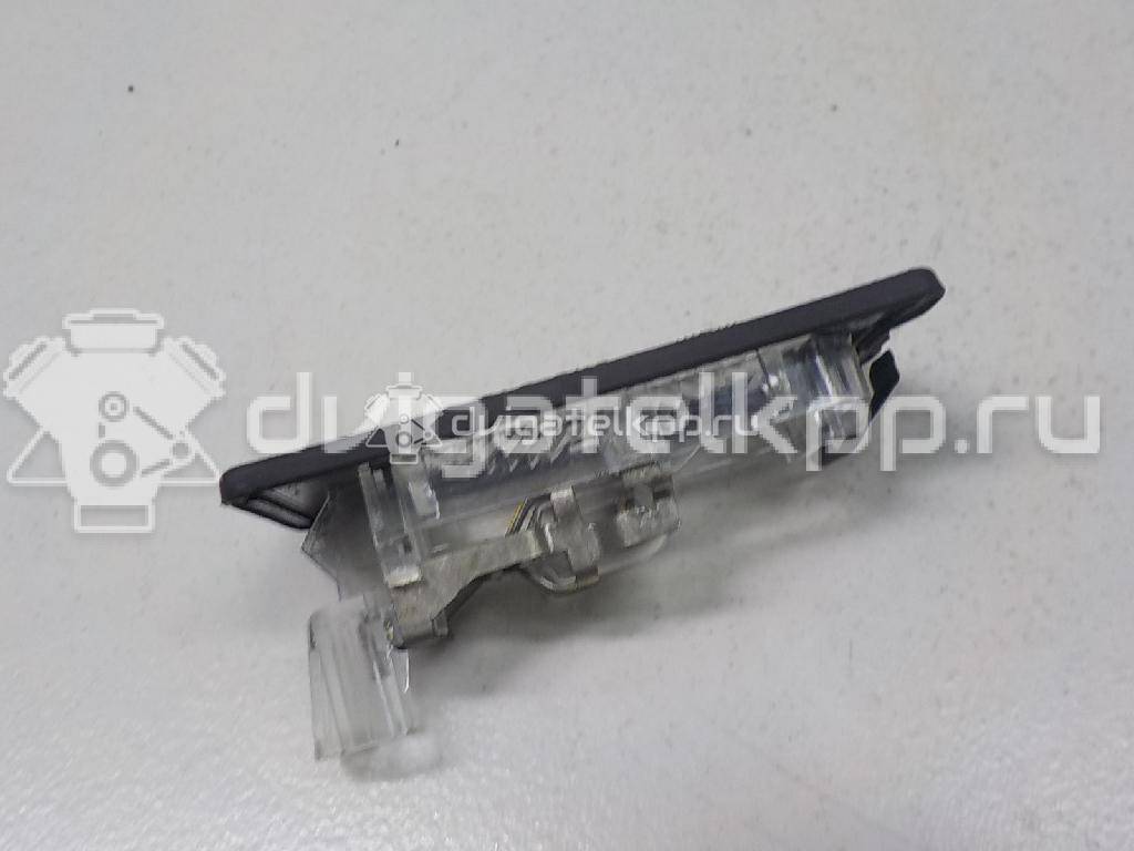 Фото Фонарь подсветки номера  5N0943021A для Seat Ibiza / Alhambra {forloop.counter}}