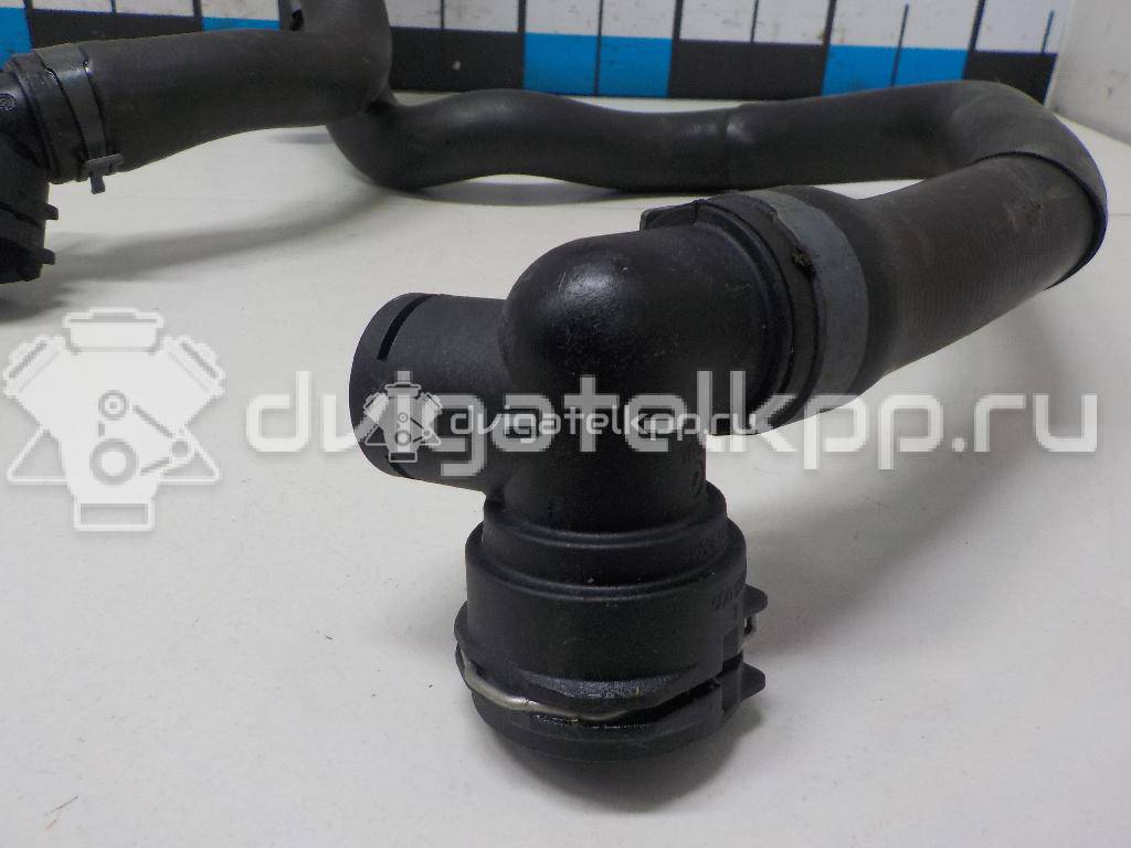 Фото Патрубок радиатора  5Q0121049AD для Seat Leon {forloop.counter}}